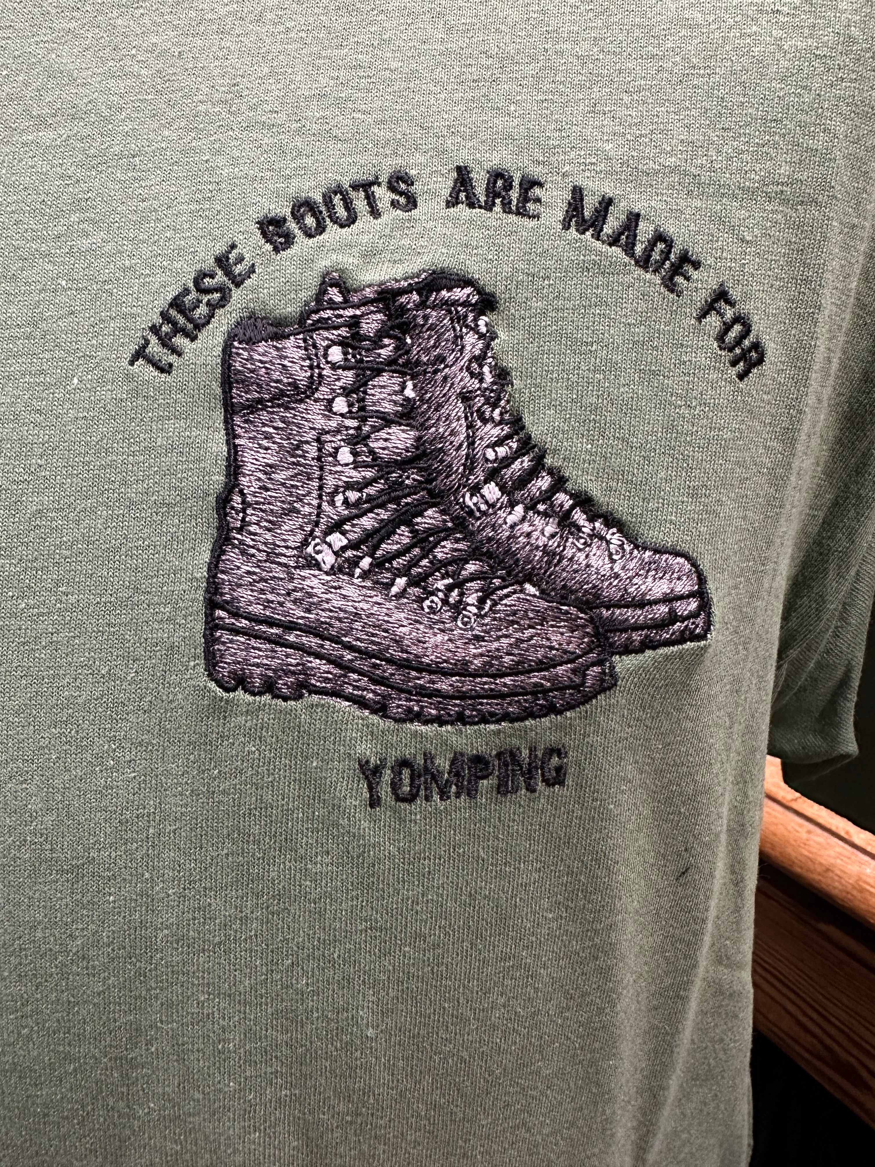 Green shirt with embroidered boots and text 'These boots are made for yomping' 