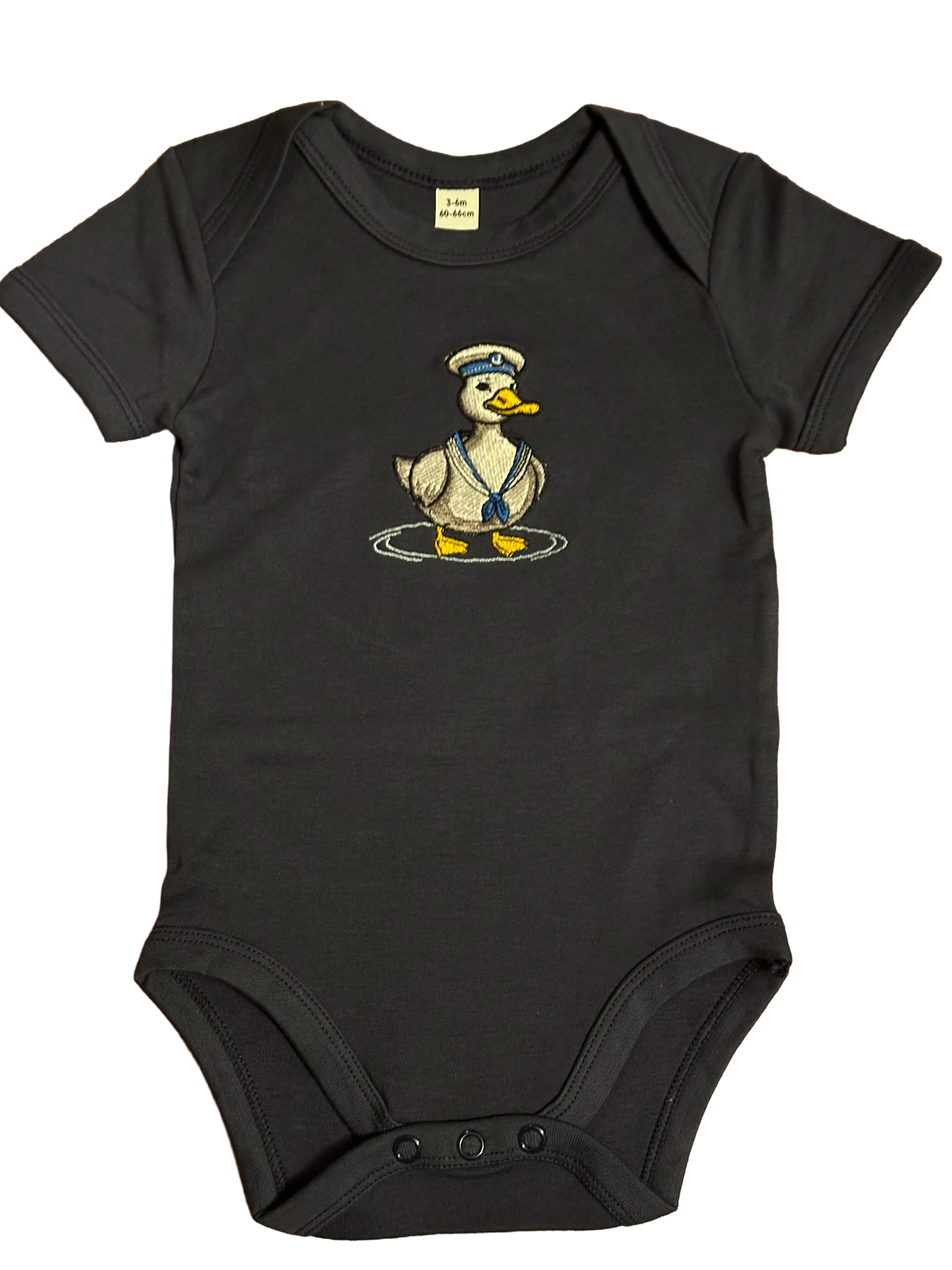 Navy baby onesie with a cartoon duck design on a white background