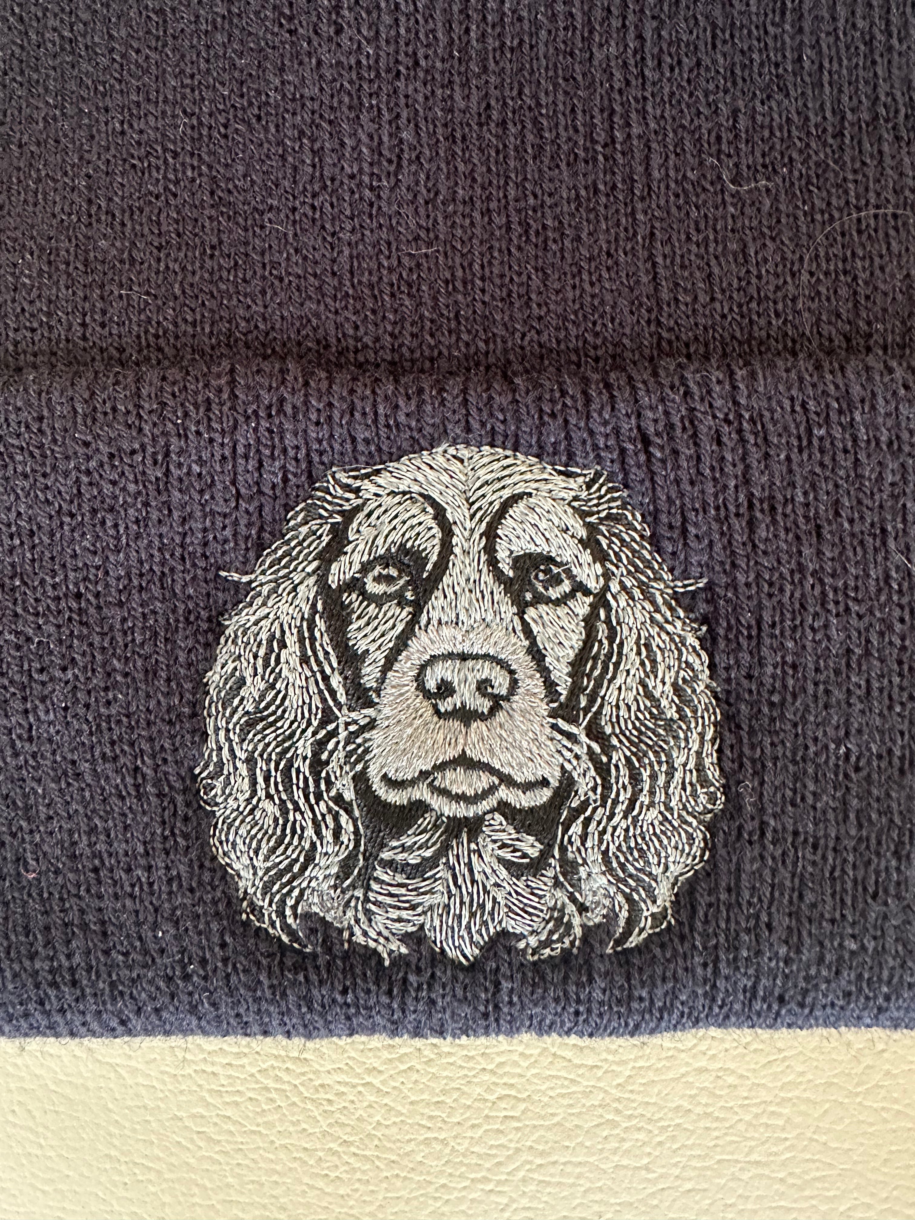 Reflective embroidered dog design on a Beanie